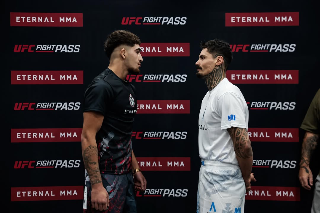 Kourosh Arvan and his opponent face off at the weigh-in
